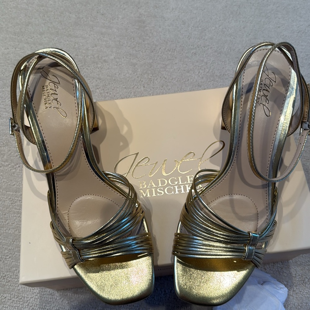 Badgley Mischka Gold Heels with Straps and Ankle Buckle
Never worn kept in box